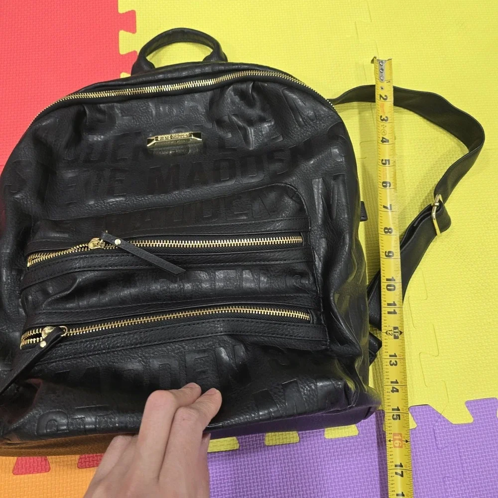 Steve‎ Madden Black Pebbled Vegan Leather Backpack Embossed Logo Gold...